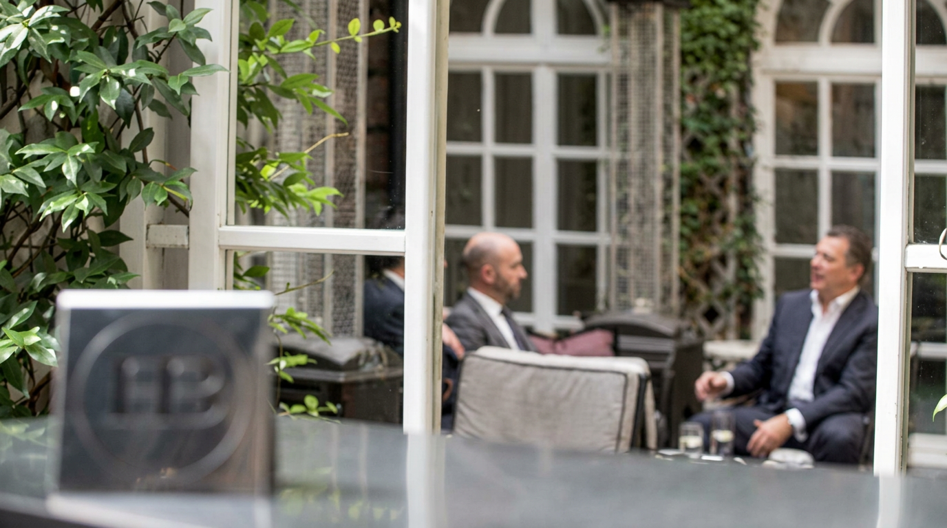 Business discussion in the courtyard at Hamilton Bradshaw's London headquarters